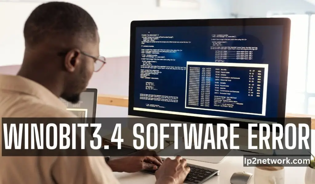 Person troubleshooting a Winobit3.4 software error on a computer screen displaying code and system logs in a modern office environment.